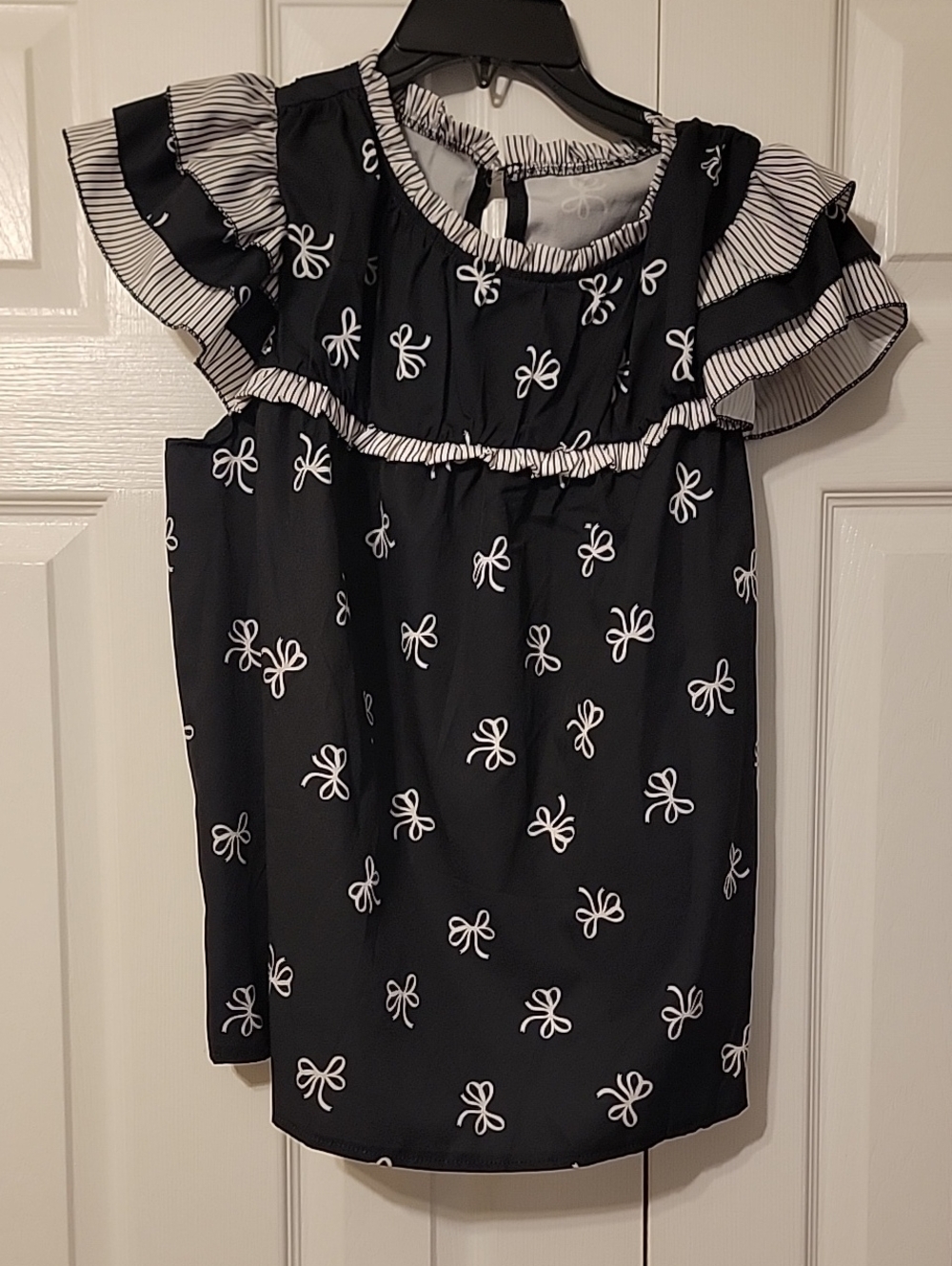 Black Bow Print Ruffle Neck Blouse